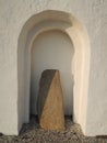 Viking tombstone with runes outside rural church