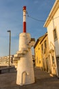 Vila Praia de Ancora, Portugal, 10/15/2018: ancient small lighthouse on the embankment. Old european architecture.