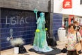 Vila real de Santo Antonio , Portugal - OCT 12 2.019 - living statue woman with very long blue dress still in the street