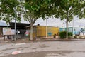 Entrance to children's school barracks modules, located in the park surrounded by trees in Viladecans.