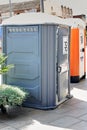 Viladecans, Spain - September 17, 2023: Portable temporary plastic bathroom for construction work on the street.
