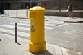 Viladecans, Spain - September 14, 2023: Yellow mailbox for sending postal letters of the Spanish.