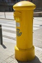 Viladecans, Spain - September 14, 2023: Yellow mailbox for sending postal letters of the Spanish.