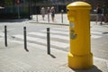 Viladecans, Spain - September 14, 2023: Yellow mailbox for sending postal letters of the Spanish.