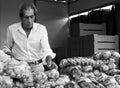 Vilareal de Santo Antonio , Portugal - OCT 12 2.019 - candy seller in street market in black and white photo