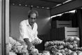 Vilareal de Santo Antonio , Portugal - OCT 12 2.019 - candy seller in street market in black and white photo