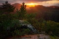 Vileminina vyhlidka, beautiful morning view with sun over sandstone cliff into deep misty valley in Bohemin Switzerland, foggy Royalty Free Stock Photo