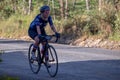 A woman rides her bicycle Royalty Free Stock Photo