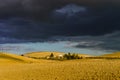 Villa in Italy, old farmhouse in the waves of tuscanian fields and hills Royalty Free Stock Photo