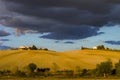 Villa in Italy, old farmhouse in the waves of tuscanian fields and hills Royalty Free Stock Photo