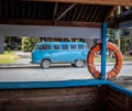 Old classic blue van near lifeguard cabin