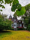 Villa Undine in Binz, Germany seen through leaves