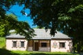 Village art museum, facade and entrance of old restored bulilding with painted traditional geometric ornaments on the wall