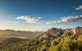 Village of Belgodere in Corsica lit by late afternoon sun Royalty Free Stock Photo