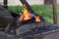 Village Blacksmith near forge hearth and anvil at work