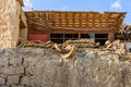 Village building in a tibetan village. There are horns and dried litter of yak near each house