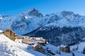 Village of Chazelet facing La Meije peak and glacier Ecrins National Park Massif in winter. Alps, France