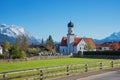 Village church wallgau at springtime, beautiful spa town in the bavarian alps Royalty Free Stock Photo