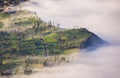 Village and Cliff at Bromo Volcano in Tengger Semeru, Java, Indo Royalty Free Stock Photo