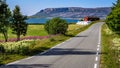 Village on the coast of the Norwegian fjord, in the distance you can see the mountains Royalty Free Stock Photo