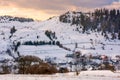 Village down the hill on winter sunset Royalty Free Stock Photo