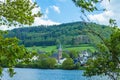 Village Einruhr at Eifel National Park, Germany. Scenic view of lake Rursee and small town in the background