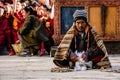 Village elder sitting at the Tibetan Buddhist Tiji Festival in Lo Manthang, Nepal