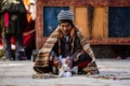 Village elder sitting at the Tibetan Buddhist Tiji Festival in Lo Manthang, Nepal