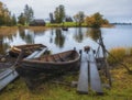 village fishing boat made of boards in the Kizhi Museum Reserve in the north of Russia on Lake Onega with docks and a pier in gol Royalty Free Stock Photo