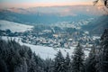 Village of Hausen in the Wied valley in winter snow with the golden sun setting