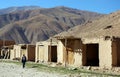 A man walks along the road in a village between Kabul and Bamiyan in Afghanistan