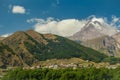 Village Kazbegi and Mount Kazbek in Georgia Royalty Free Stock Photo