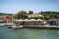 Village of Kioni on island of Ithaka in Greece with boats and cafes