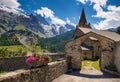 La Grave village and its church in the Ecrins National Park with La Meije peak. Summer in Hautes-Alpes, France Royalty Free Stock Photo