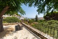 The Village of Lefkes on the cyclades island of Paros. A park bench on a hill under a big tree with a panorama view to the aegean