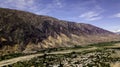 Village Maimara under colorful rock called Painter`s Palette in Quebrada de Humahuaca valley. Argentina Royalty Free Stock Photo