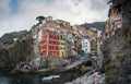 Village of Manarola with colourful houses at the edge of the cliff Riomaggiore, Cinque Terre, Liguria, Italy