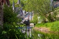 View at river elz, half-timbered houses and castle Loewenburg in the background Royalty Free Stock Photo