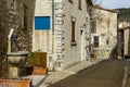 _JP01384-village street with a fountain in provence Royalty Free Stock Photo