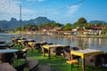 Village and mountain in Vang Vieng, Laos and Nam Song rive , Laos. Southeast Asia