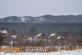 Village in the mountains in winter.