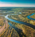 Village Near River, Aerial View Green Forest Woods And River Landscape In Sunny Spring Summer Day. Top View Of Royalty Free Stock Photo