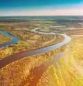 Village Near River, Aerial View Green Forest Woods And River Landscape In Sunny Spring Summer Day. Top View Of Royalty Free Stock Photo