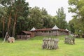 A village in the old Russian style, reminiscent of an outpost, made of wood