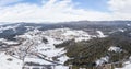 village RiedelhÃÂ¼tte in Bavarian forest with mountains Arber Rachel and Lusen in winter with snow and ice, Germany.