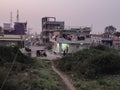 A village road with autorickshaw with houses