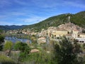 The village of Roquebrun sitting on the river Orb in the Haut La Royalty Free Stock Photo