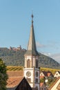 Village of Rorschwihr in Alsace on the wine route with the Haut Koenigsbourg castle in the background