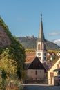 Village of Rorschwihr in Alsace on the wine route with the Haut Koenigsbourg castle in the background