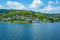 Village Rurberg at Eifel National Park, Germany. Scenic view of lake Rursee and houses in the background